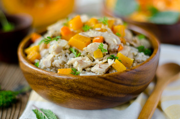 Wheat porridge with chicken and pumpkin