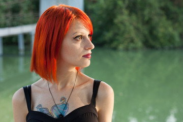 Pretty girl walks on the bridge