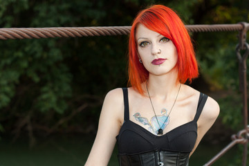 Pretty girl walks on the bridge