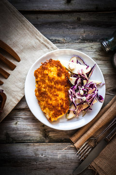 Chicken schnitzel with red cabbage,pears and gorgonzola