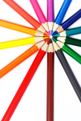 Colorful pencils in radial arrangement