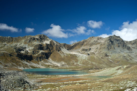 Beautiful turquoise alpine lake in the Swiss Alps