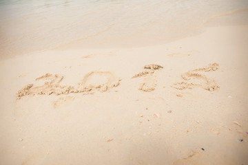 2015 write on white sand