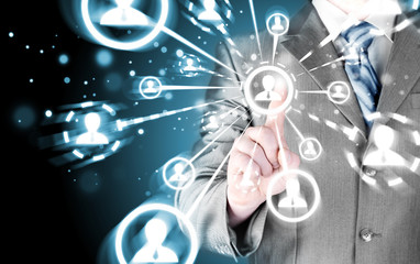 man hand pressing social media icon