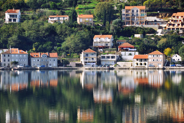 Fototapeta na wymiar Old town in Adriatic Coast with reflection