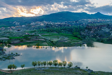Clouds illuminated rising sun