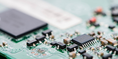 PCB with different components (close-up shot)