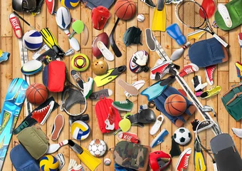 Zelfklevend Fotobehang Sports equipment has fallen down in a heap in the gym © Zarya Maxim