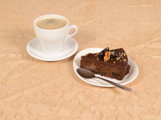 chocolate pie with  a cup of coffe