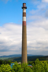 Fototapeta na wymiar A single industrial chimney