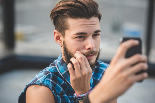 Young Handsome Bearded Hipster Man Selfie