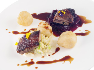 roast goose, red and white cabbage and dumplings