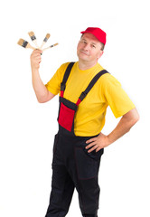Worker showing brushes