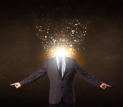 Business man with glowing exploding head