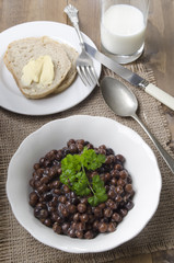 grey peas with parsley in a bowl