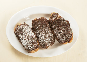 Eclairs with chocolate chips