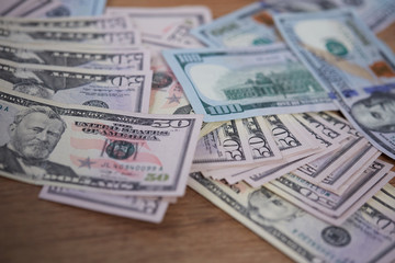 money in a chaotic manner on the floor