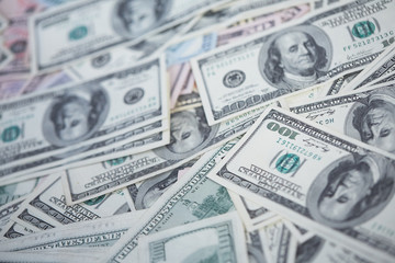 money in a chaotic manner on the floor