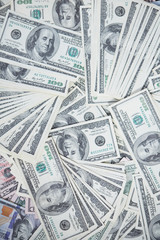 money in a chaotic manner on the floor