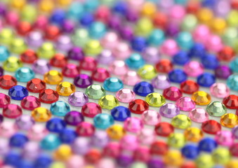Colorful og shiny gems background.
