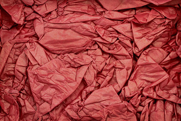 Wrinkled red paper as background