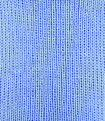 Blue knitting wool texture background.