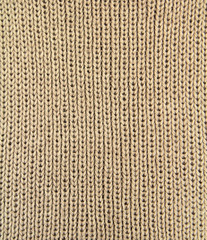 Fototapeta premium Brown knitting wool texture background. 