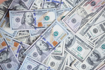 money in a chaotic manner on the floor