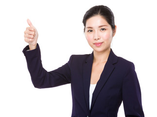 Businesswoman with thumb up