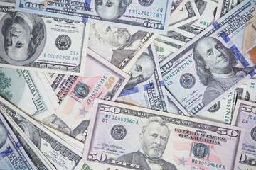 money in a chaotic manner on the floor