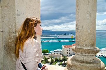 Fototapeta na wymiar Split. View from the tower. girl looking down