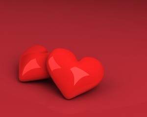 two hearts over red background