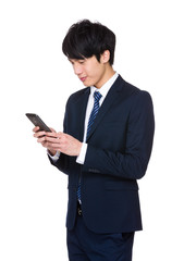 Businessman look at cellphone