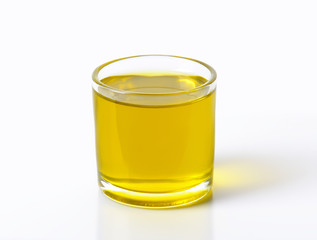 Glass of olive oil