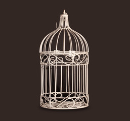 Shabby chic bird cage isolated on black background