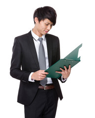 Businessman look at clipboard