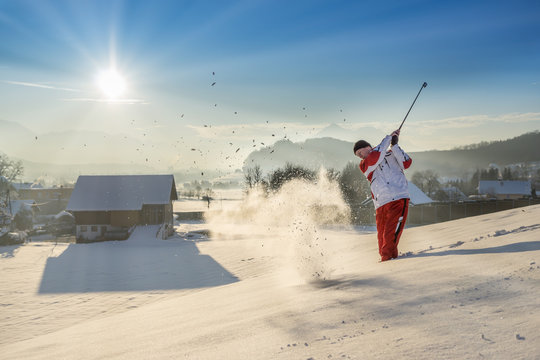 Golf im Schnee mit Sonne