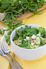 Pasta salad with farfalle, peas and feta