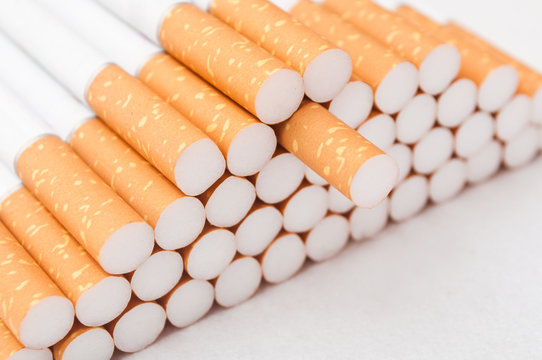 cigarettes closeup on white background