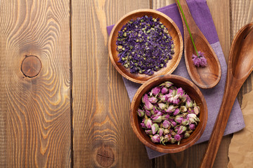 Spices and utensils over wooden table