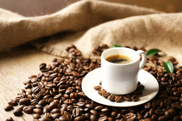 Cup of coffee on wooden table