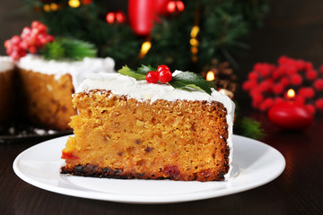 Slice of cake covered cream with Christmas decoration