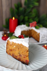 Slice of cake covered cream with Christmas decoration