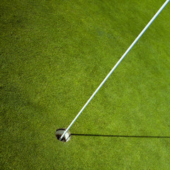 Obraz premium golf flag in green hole