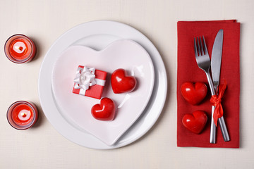Festive table setting for Valentines Day on light background