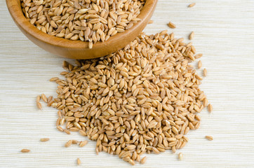 spelt on table cloth, close up