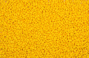 yellow polymer pellets for background