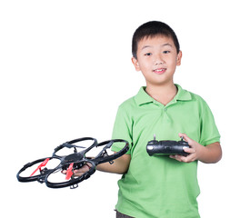 Boy holding a radio remote control for helicopter, drone, plane