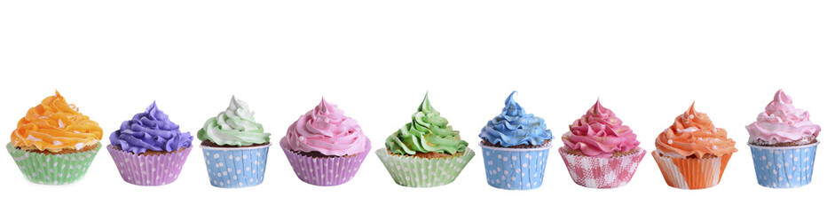 Delicious cupcakes isolated on white