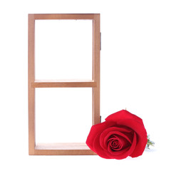 wood shelf decorated with red rose flowers isolated on white bac